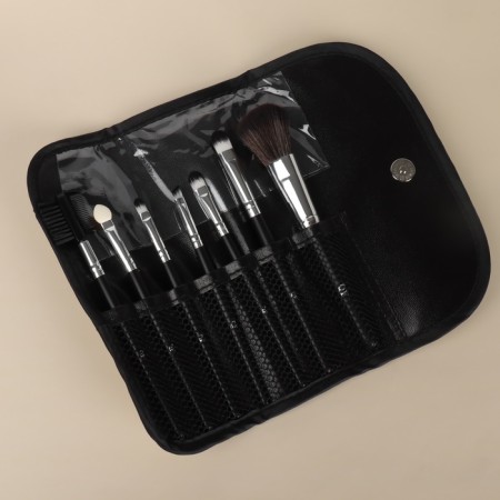 A set of makeup brushes "monogram", 7 objects, a cover on a button, golden color/black-7