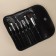A set of makeup brushes "monogram", 7 objects, a cover on a button, golden color/black