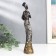 Polystone souvenir "African with a jug, in a dress with silver flowers" mix 25.5x7x5 cm