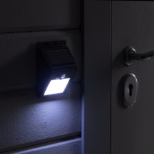 Garden lamp on a sunny battery with a motion sensor, invoice, 9.5 × 13 × 5 cm, 64 LED, glow white