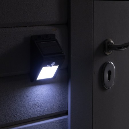 Garden lamp on a sunny battery with a motion sensor, invoice, 9.5 × 13 × 5 cm, 64 LED, glow white