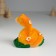 Polystone souvenir "Orange snakes with flowers on the grass" 6x5.8x8.8 cm