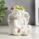 Polystone souvenir "Snowthrough angel with a rose, in a wreath of roses" MIXs 8x7.2x6 cm