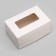 The box is folding, with a window, white, 15 x 10 x 7 cm