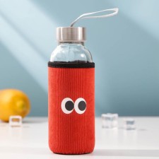 A glass bottle in a “eyes” cover, 300 ml, h = 17.5 cm, mix drawing