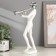Polystone souvenir "Musician with saxophone" White with silver 29.5x10.5x13.5 cm