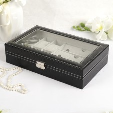 Casket to the leatherette for the clock 6 department. and glasses 3 department. 