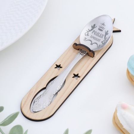 A spoon is registered, tea, with an engraving "Roman", h = 14