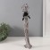 Souvenir Polystone "African in Gel, with a bouquet" Geometric patterns, white 7.5x6.5x33.5 cm 103234