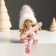 Souvenir Polystone "Baby/Baby in a pink suit, with skis" sits mix 5x6x14 cm