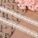 Knitted lace, 15 mm × 10 ± 1 m, beige color