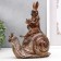 Polystone souvenir "Rabbit with a book on a snail" 20x17x8 cm
