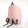 Youth backpack from textiles, 2 parts on lightning, 3 pockets, pink color