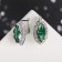 Earrings with rhinestones "Edel" Ellipse openwork, emerald color in silver