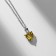 Piece "heart" with a rhinestone, white-yellow color in silver, 42 cm