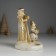 Polystone candlestick "Santa Claus in a brown fur coat with a snowman" d = 3? 5 cm 10.3x9.8x14 cm