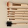 A set of makeup brushes "France", 7 items, on a button, beige/pink color