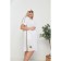 Female dress, size 56, white color