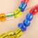 Lacing "colored caramels", 24 pcs., According to the Montessori methodology