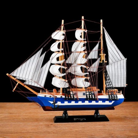 The ship souvenir medium “Corsica”, the sides are blue with a white strip, white sails, 43x8.5x37 cm