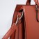 Women's bag El Masta with a zipper, external pocket, long belt, redhead color