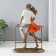 Polystone souvenir "Kiss on the bridge" of bronze, orange-white 17x8x25 cm
