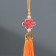 Suspension textiles, plastic "Knot of happiness and infinity" Orange 0.7x1x9.5 cm