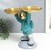 Souvenir Polystone stand "Cosmonaut in turquoise with two dishes" 14x26.5x32 cm