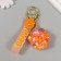 A keychain plastic with a carbine, a strap of "paw with balls" Water with sparkles 4.5x5x2 cm