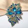Brooch "Empress" dew, blue color in gold