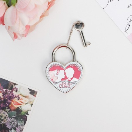 Wedding castle with the key "You + I = Family."-1