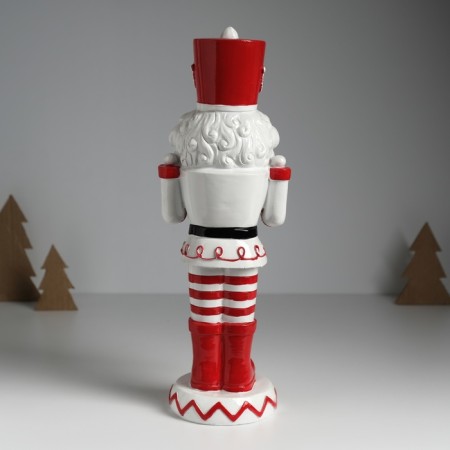 Polystone souvenir "Nutcracker with curls in a red-white uniform, with a drum" 11x11x32 cm 1032587-3
