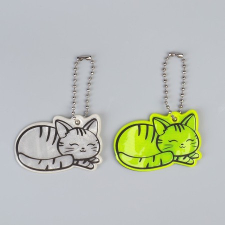 The reflective element "cat", bilateral, 5.5 × 3.7 cm, color mix-4