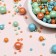 Sprinking confectionery "pearls", emerald, turquoise, peach, 50 g
