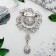 Brooch "Empress" circle, white-green color in silver
