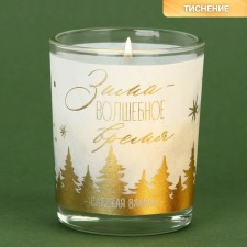 New Year's candle in a glass 