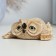 The figure "owl lies with a layer" beige, 7x7x3cm