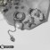 Earrings with the removable element "Transformer" dog, white color in silver