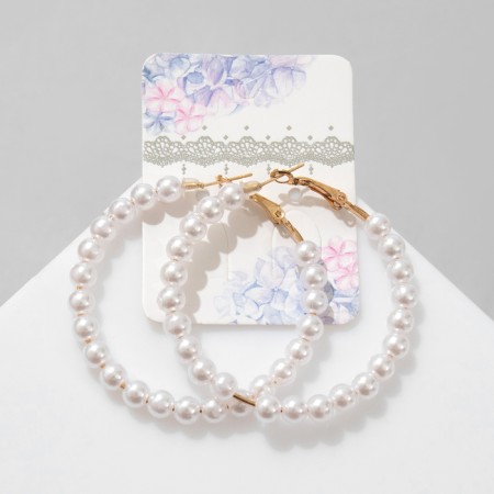 Earrings-rings "Tenderness of pearls" are medium ring, white color in gold, d = 5.5 cm-4