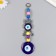Suspension from the evil eye "Filin on a branch" 21 cm mix