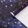 Package paper, glossy "stars", 70 x 100 cm, 1 sheet