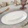 Oval porcelain dish with a thickened edge of the White Label, 30.5 × 20 × 3 cm, white color
