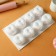 Form for mousse desserts and baking konfinetta “peaches”, silicone, 29.5 × 17 × 4.5 cm, 8 cells, white color