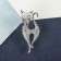 Brooch "Cat" elegant with a bow, white color in silver
