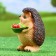 Garden figure "Hedgehog with a leaf" 12x11x16cm
