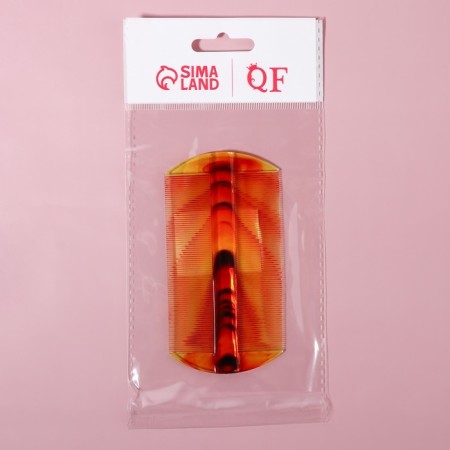 The comb is bilateral, 10.5 × 5 cm, the color "amber"-2