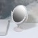 The mirror of the desktop "oval", bilateral, with an increase, the mirror surface is 11 × 15.5 cm, the color is white