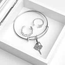 Set of children's “chosen” 3 subjects: bracelet, 2 rings, ballerina, white color in silver
