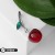 Burgundy-green in silver