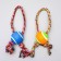 A cable toy with a ball and adjustable rope, up to 100 g, a mix of flowers